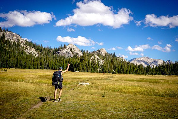 Hiking Man With Fist In the Air