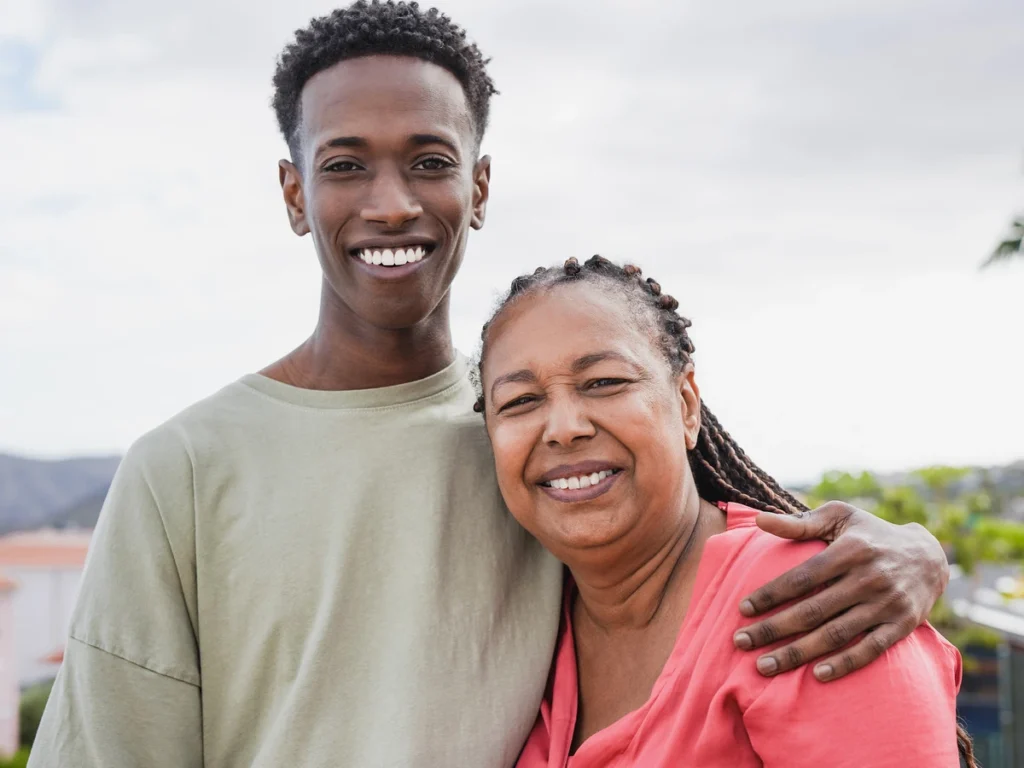 questions to ask before enrolling in a rehab center program - mother and son smiling